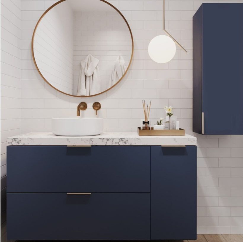 Blue and gold bathroom with a 42