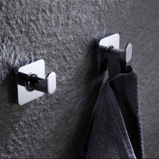 Ico robe hook from the vapor series in chrome with a grey towel