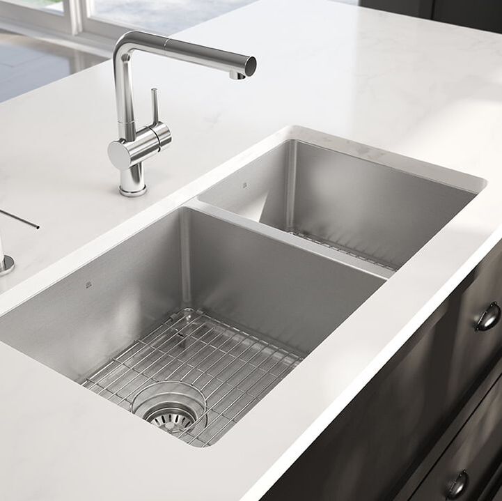 Julien Prochef undermount sink an a half kitchen sink in island with modern chrome faucet