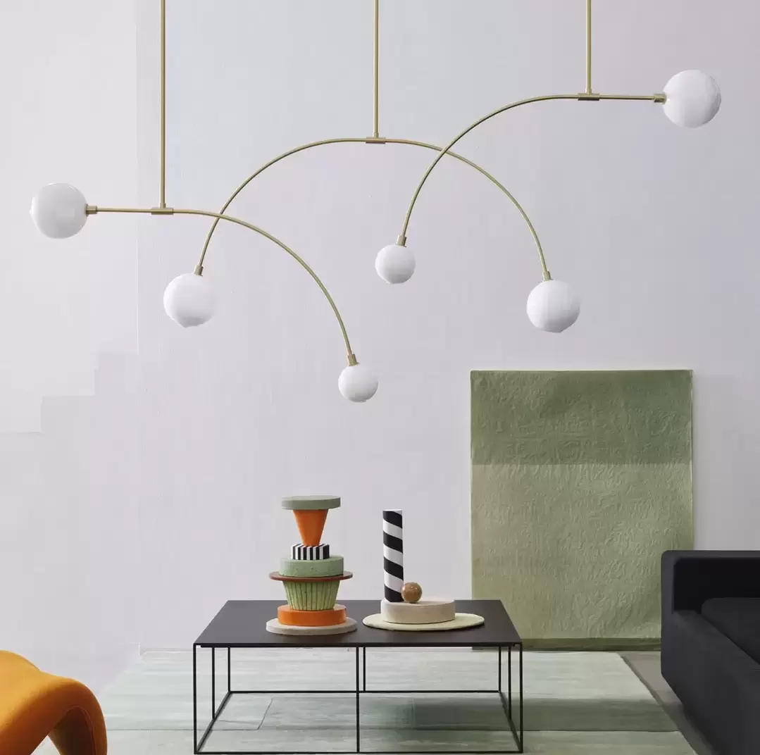 Modern hand blown glass  lighting pendant in brushed brass and white by sklo