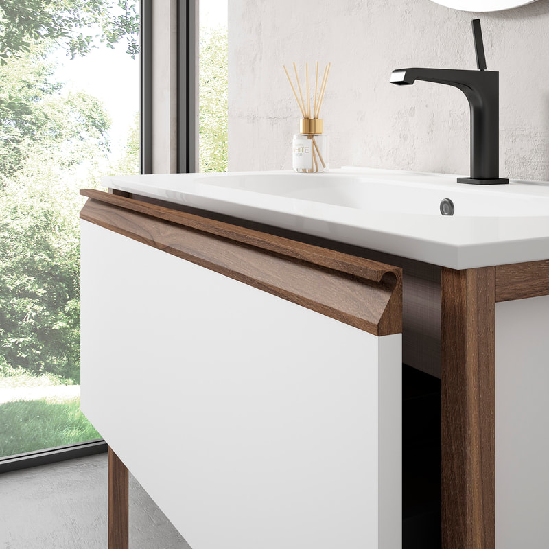 Ico walnut and matte white vanity with a seamless white countertop and matte black Axor single hole faucet next to a window showing a garden